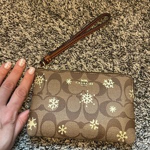 Coach snowflake wristlet khaki and gold